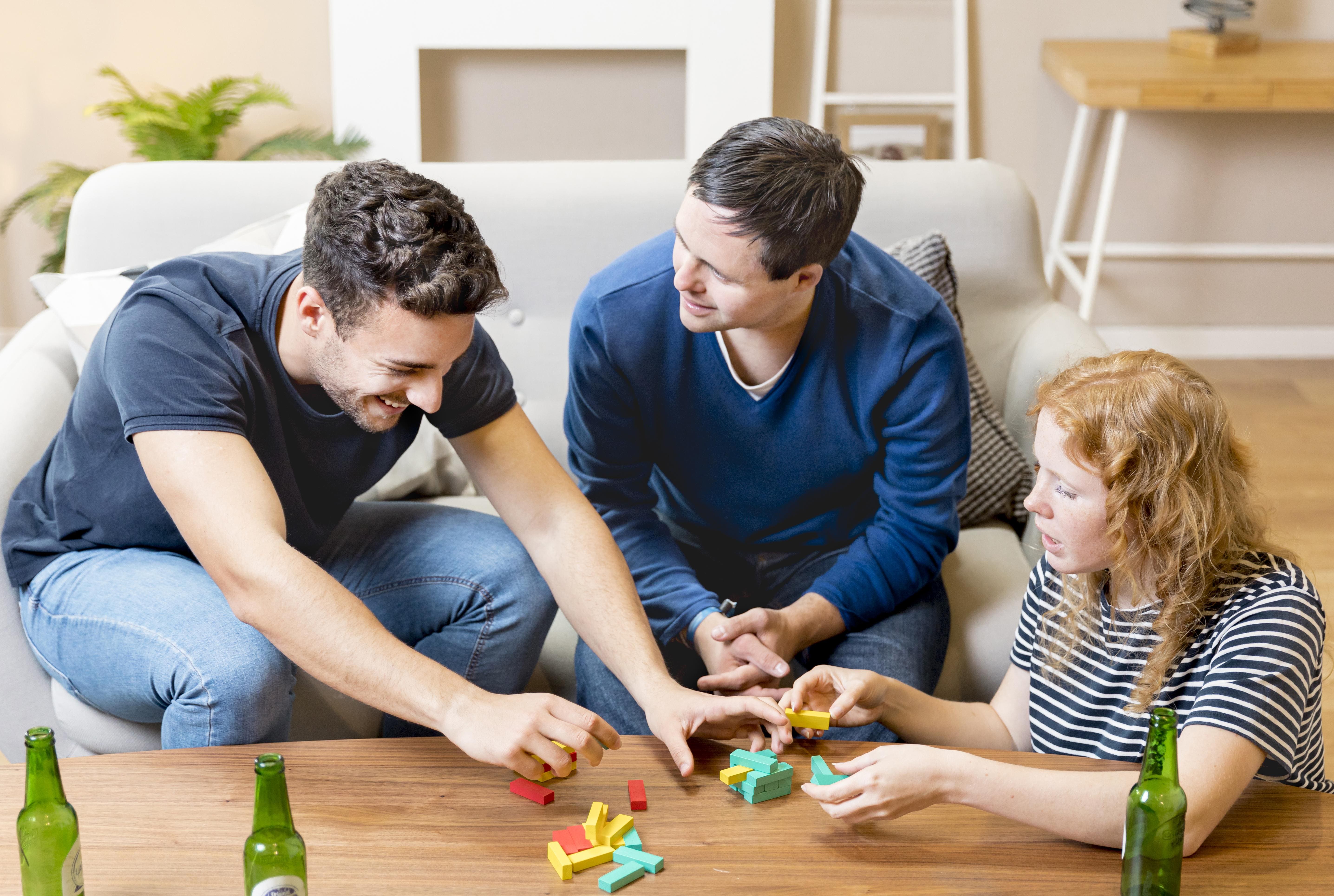 Group of friends playing board games